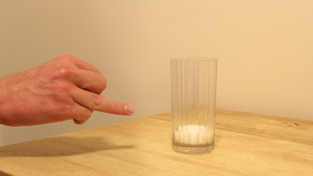 Illustration for article titled Astounding: 7 Incredible Photos Of Hands Pointing To Glasses Of Milk With Their Ring Fingers